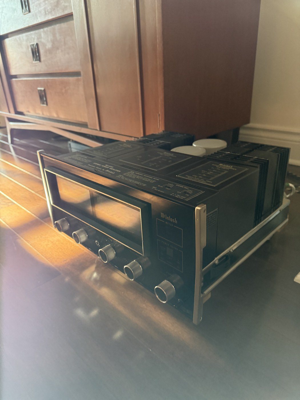 McIntosh MC2255 stereo power amplifier with glowing blue meters