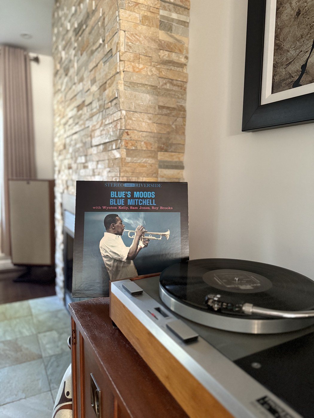 Thorens turntable with a Blue Mitchell Blue's Moods jazz record spinning